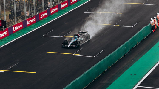 Formula racing car on a wet circuit during a race
