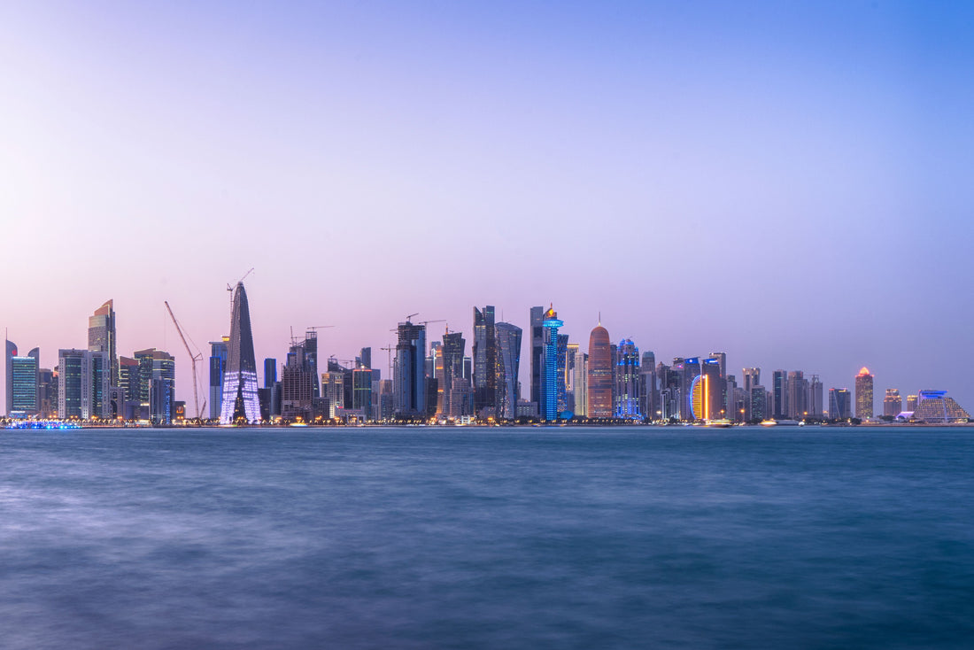 Doha skyline at twilight beside the waterfront in Qatar