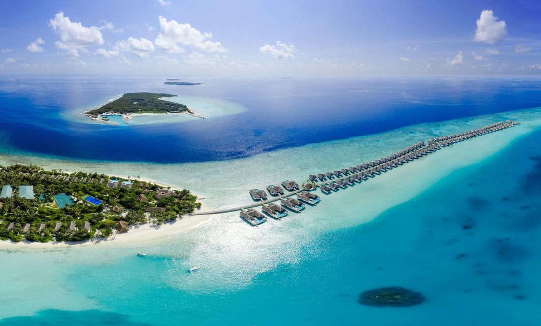Overwater villas on a Maldives island resort