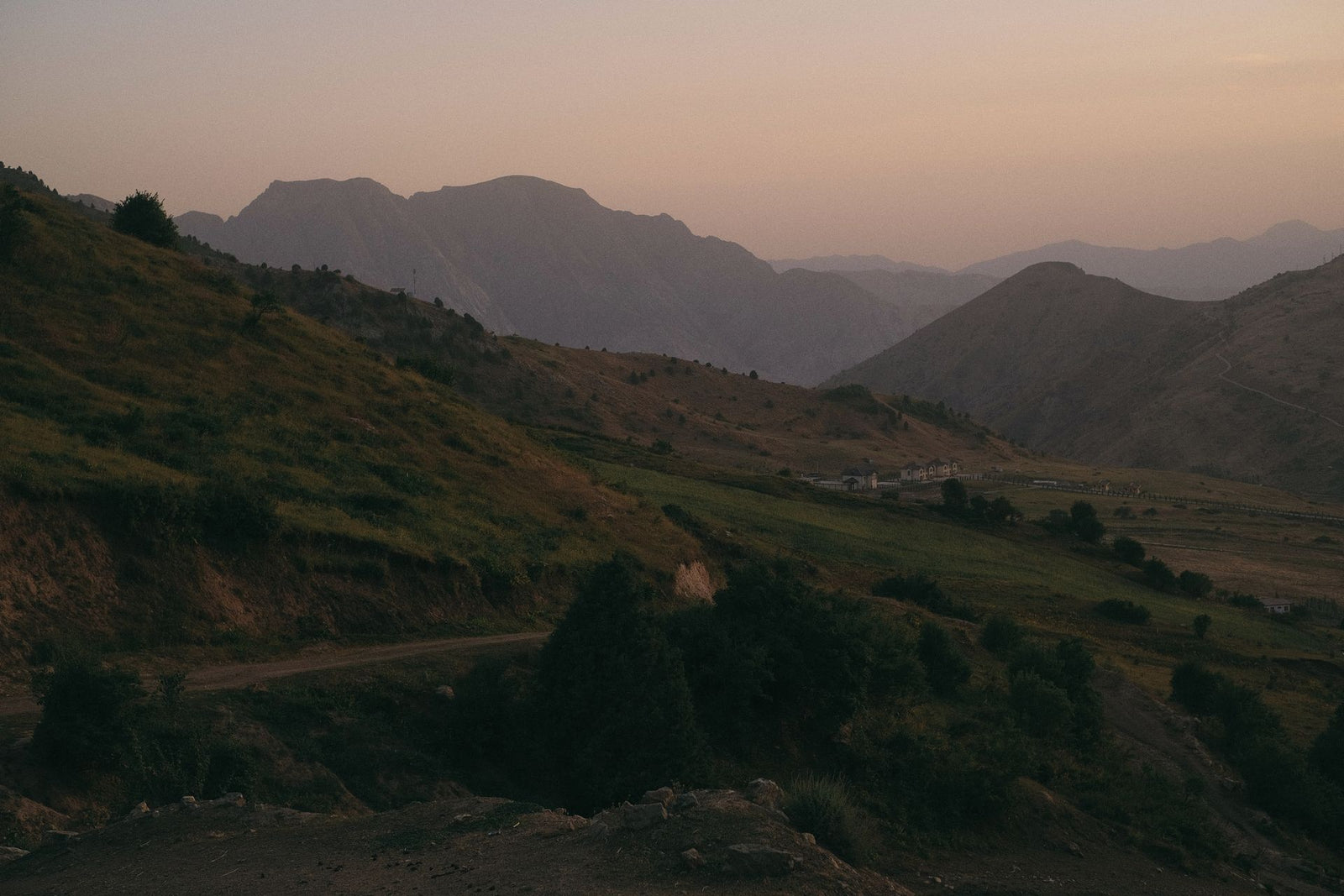 Scenic view of misty mountains and valleys at dawn in Dushanbe, Tajikistan.