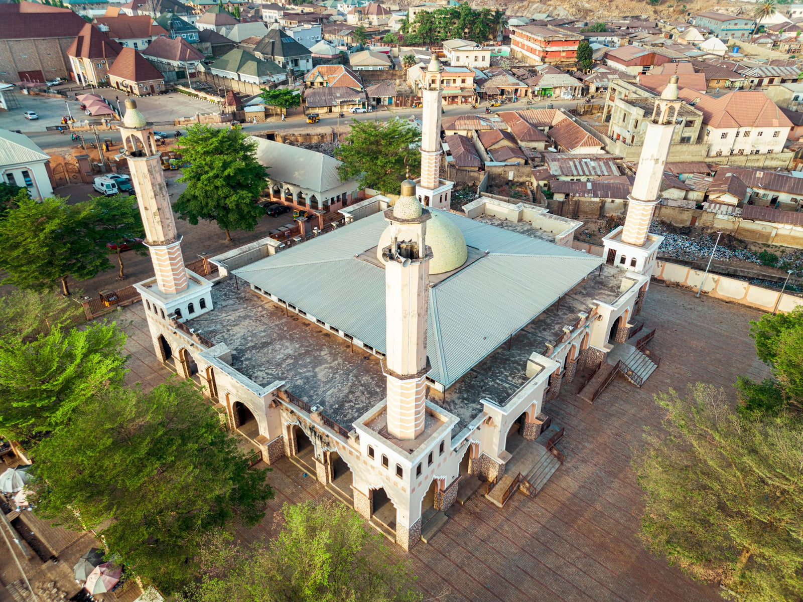 Stunning aerial view of a mosque in Kaduna, showcasing architectural beauty and surrounding area.