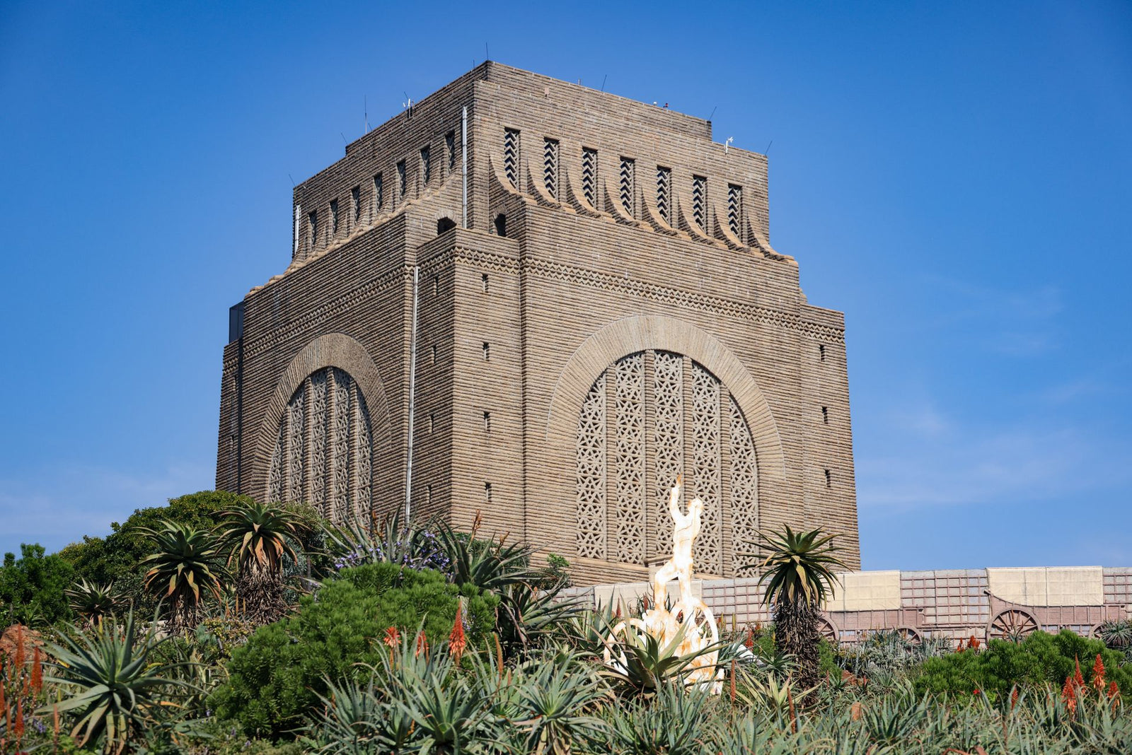 Stunning view of the Voortrekker Monument surrounded by lush greenery in Pretoria.