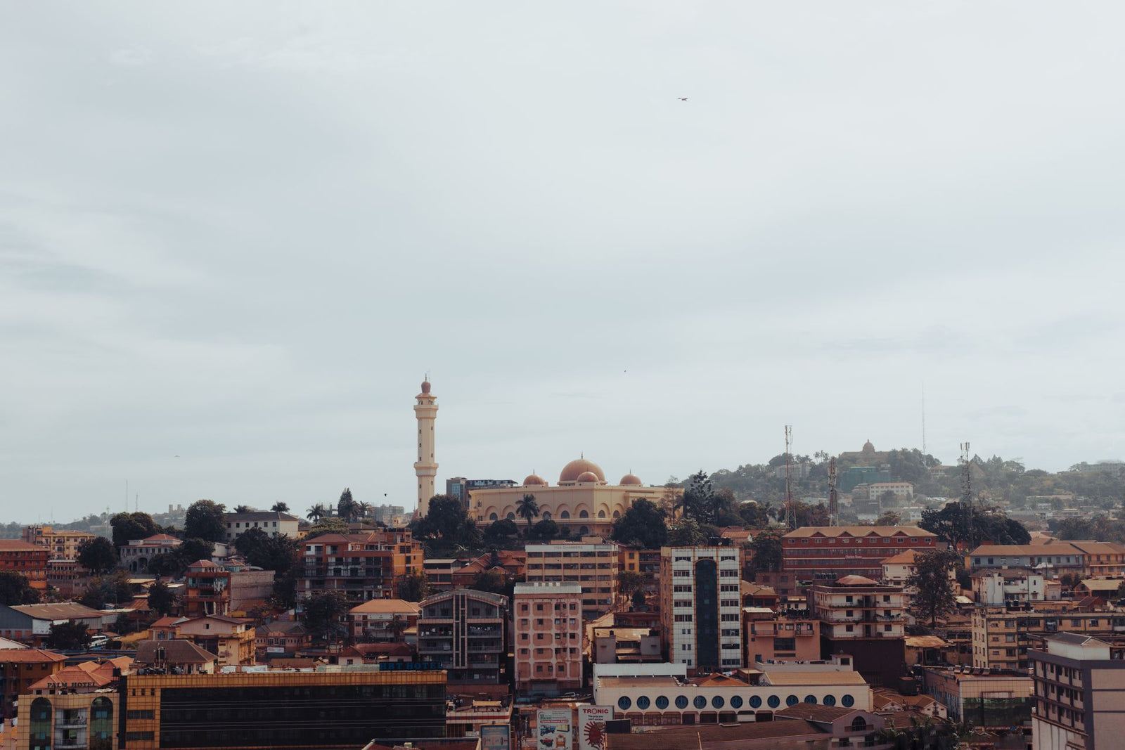 Scenic aerial view of Kampala with a beautiful mosque and urban landscape.