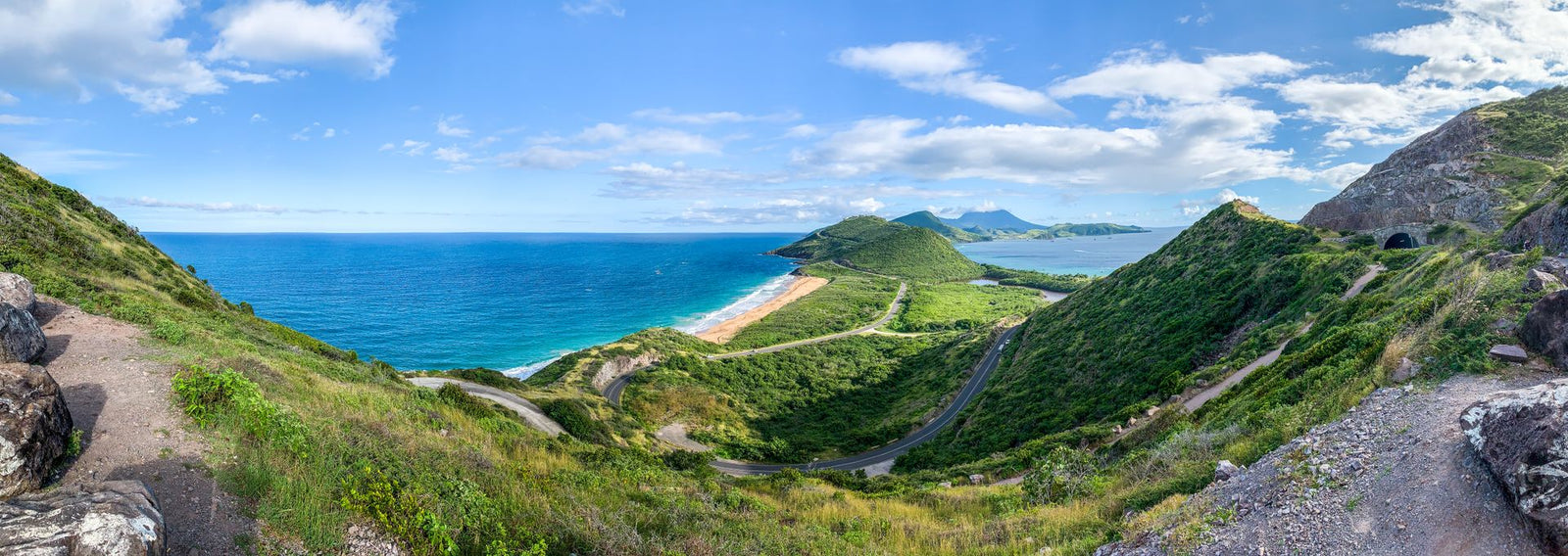 Breathtaking panoramic view of Saint Kitts lush coastline and vibrant ocean.